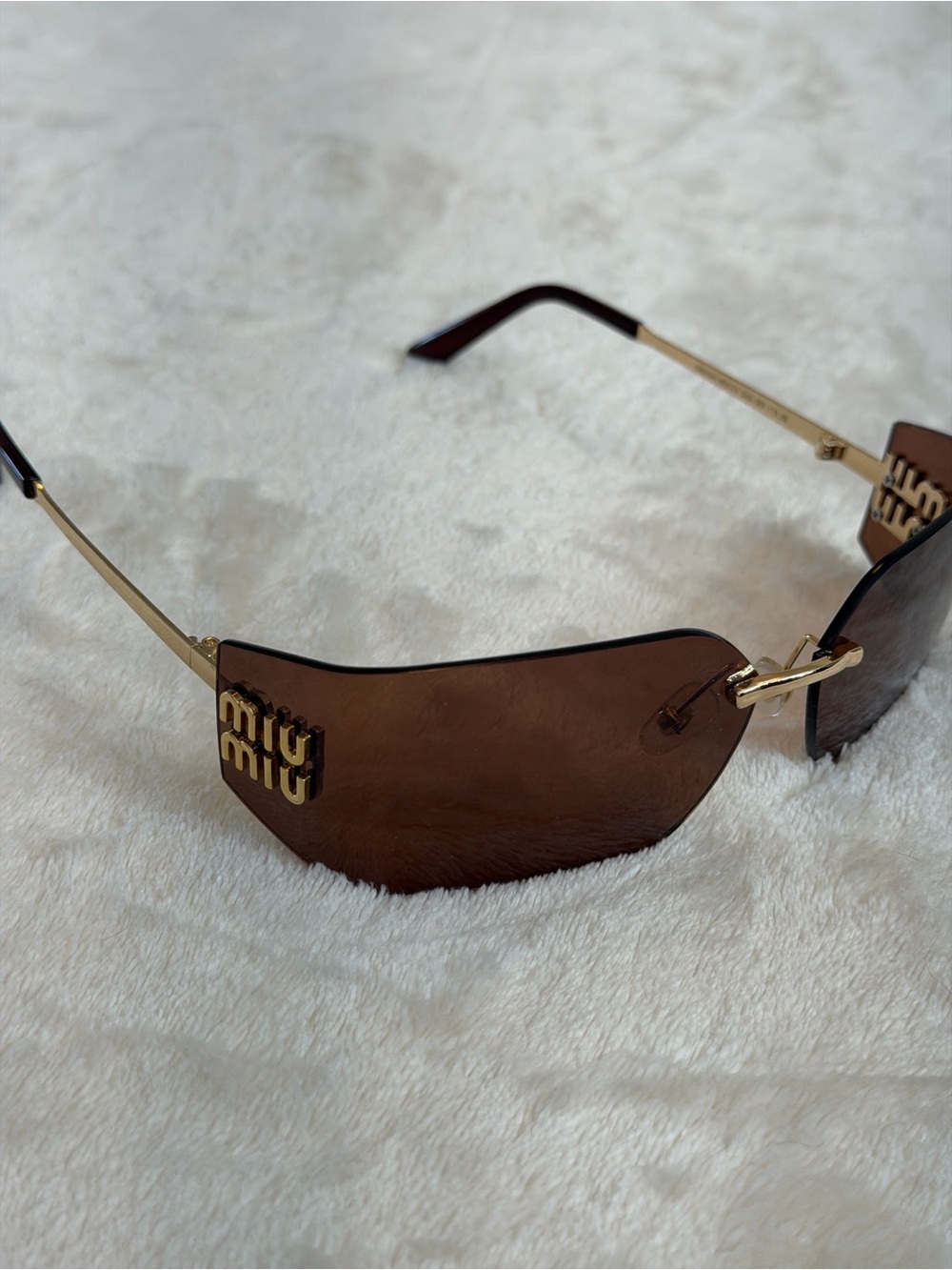 Miu Miu Gold-Arm Brown Lens Rimless Sunglasses
